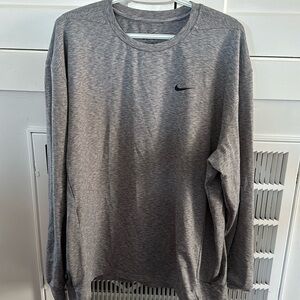 NIKE. Men’s, gray, DRI FIT, heavier material, long sleeved shirt.